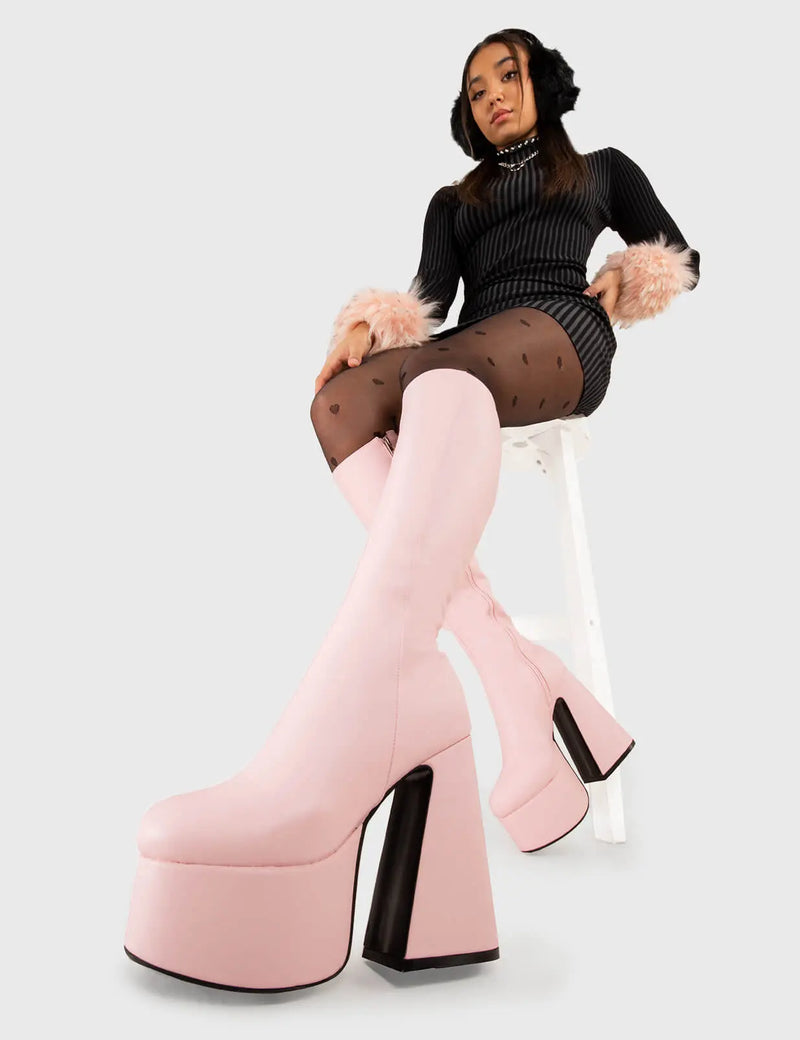 NICE AND SMOOTH
  
  Hate You Platform Knee High Boots in Pink faux leather. These platform boots feature a minimalist look with a Flared heel, keeping it nice and classy. Made with eco-friendly materials and 100% cruelty-free, these platform boots are as ethical as they are chic.
  
  - Platform Height
  - Knee high 
  - Flared heel
  - High Heel
  - 100% vegan 
  
  SKU: LMF 3355 - PinkPU