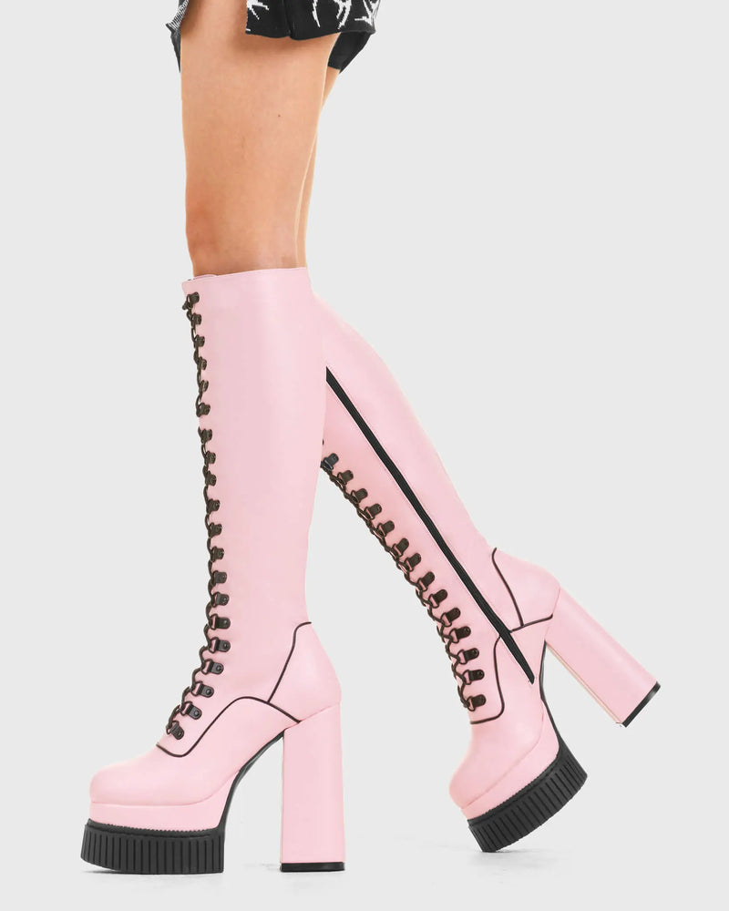 HIGH IN THE SKY
  
  Hidden Agenda Creeper Platform Knee High Boots in Pink faux leather. These vegan western Boots feature a lace up design and Black stitch detailing. Made with eco-friendly materials and 100% cruelty-free, these boots are as ethical as they are trendy!
  
  
  - Heel Height 
  - Knee high length
  - Black stitching
  - Black zip 
  - Rubber grip sole
  - Rounded toe 
  - 100% vegan 
  
  SKU: LMF 3968 - PinkPU