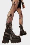 Link Love

High On Love Chunky Platform Ankle Boots in Black faux leather. These black platform boots feature adjustable black laces with silver eyelets and two black straps with square shaped buckles, make your fashion statment. Made with eco-friendly materials and 100% cruelty-free, these platform boots are as ethical as they are Powerful!

- Platform Height
- Two silver chains
- Black laces with silver eyelets 
- Black straps with square shaped buckles 
- Chunky Platform sole
- Round Toe 
- 100% vegan