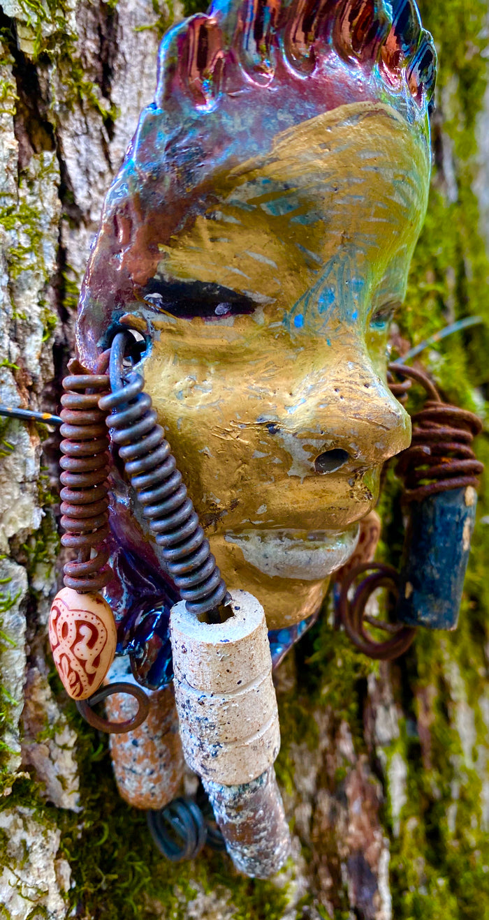 Meet Hope! I started making art soon after seeing authentic African artwork at the Smithsonian Museum of African Art. I was in total awe. Jafari was inspired by my visit there.   Hope has a complexion of honey mustard and dark metallic copper. She  is 6" x 4" and weighs 5 ozs. Hope has 2 tribal beads. Hope has over 4 feet of  coiled 16 gauge wire hair.