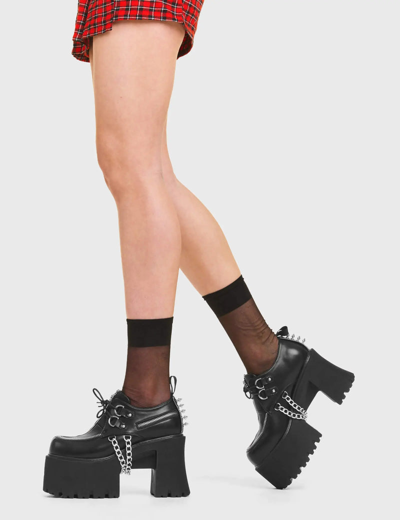 ALL OUT Hype Chunky Platform Shoes in Black faux leather. These vegan shoes feature a lace up design with a accessorised zip and two chains. Also features silver spikes very cute. Made with eco-friendly materials and 100% cruelty-free, these boots are as ethical as they are chic! - Platform - Lace up - Silver Spikes - Two chains - Fake zip - Chunky platform sole - Rounded toe - 100% vegan SKU: LMF 3939 - BlackPU