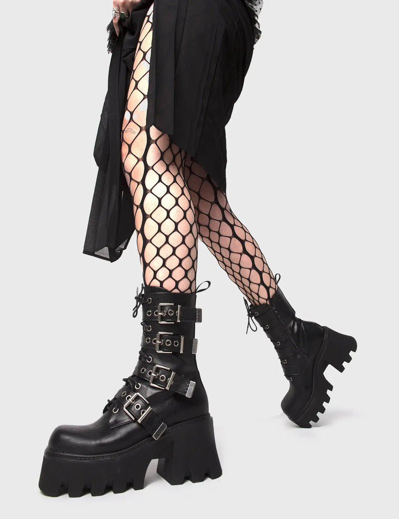 MAKE YOUR STATEMENT
  
  Hysteria Chunky Platform Ankle Boots in Black faux leather. These Platform Ankle Boots feature Silver buckles on a Chunky and comfortable Platform sole, making them the perfect choise to dress up any outfit! Made with eco-friendly materials and 100% cruelty-free.
  
  
  - Platform Height: 3.3 inch
  - High ankle height
  - Square buckles and silver eyelets
  - Chunky Platform sole
  - Lace up
  - Black zipper
  - Square toe 
  - 100% vegan 
  
  SKU: LMF 1091 - BlackPU