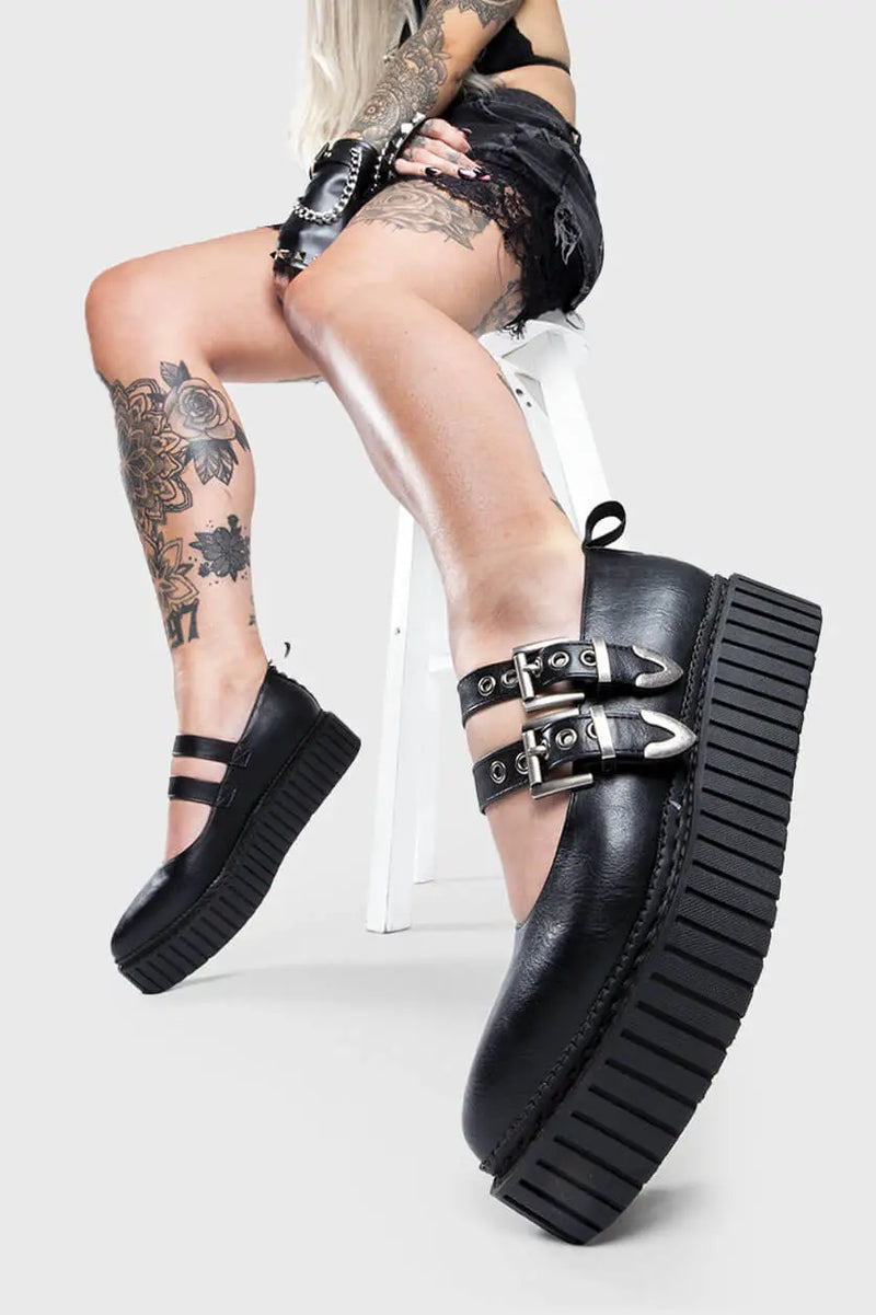Believer Bling 
  
  I'm a Believer Chunky Platform Creeper Shoes in Black. These vegan Creeper Shoes feature two adjustable chunky stap with silver eyelets, stepping into believer brilliance. Made with eco-friendly materials and 100% cruelty-free, these Creeper shoes are as ethical as they are a Bling Bombshell!
  
  - Platform Height: 2.2 inch
  - Double adjustable strap
  - Silver eyelets
  - Chunky sole
  - Pointed toe
  - 100% vegan 
  
  SKU: LMF 1426 - BlackPU