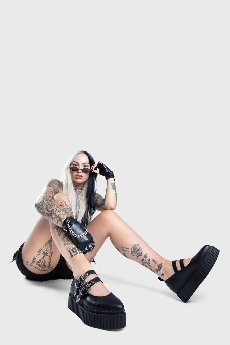 Believer Bling 
  
  I'm a Believer Chunky Platform Creeper Shoes in Black. These vegan Creeper Shoes feature two adjustable chunky stap with silver eyelets, stepping into believer brilliance. Made with eco-friendly materials and 100% cruelty-free, these Creeper shoes are as ethical as they are a Bling Bombshell!
  
  - Platform Height: 2.2 inch
  - Double adjustable strap
  - Silver eyelets
  - Chunky sole
  - Pointed toe
  - 100% vegan 
  
  SKU: LMF 1426 - BlackPU