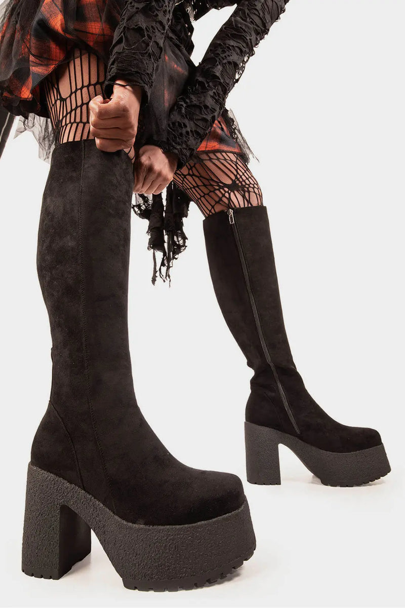Bold Steps 
  
  I'm What You Want Platform Knee High Boots in Black Suede. These Black vegan Platform Boots feature black suede material on a chunky lightweight sole, making them the perfect pair for a night out! Made with eco-friendly materials and 100% cruelty-free!
  
  - Platform Height: 1.6 inch
  - Heel Height: 4.4 inch
  - Black Zipper
  - Gusset detail
  - Wide Ankle and Calf Friendly 
  - Chunky sole
  - Round Toe
  - 100% vegan 
  
  SKU: LMF 1823 - BlackSUEDE