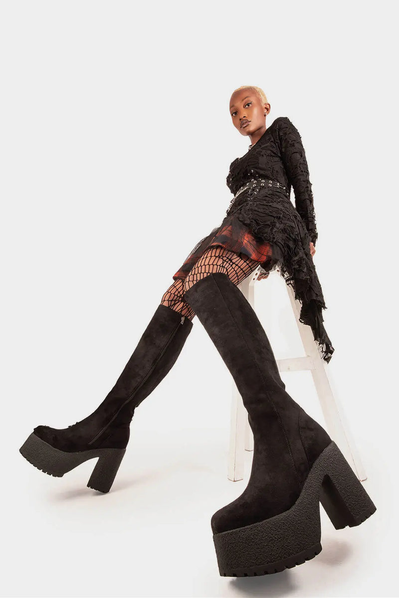 Bold Steps 
  
  I'm What You Want Platform Knee High Boots in Black Suede. These Black vegan Platform Boots feature black suede material on a chunky lightweight sole, making them the perfect pair for a night out! Made with eco-friendly materials and 100% cruelty-free!
  
  - Platform Height: 1.6 inch
  - Heel Height: 4.4 inch
  - Black Zipper
  - Gusset detail
  - Wide Ankle and Calf Friendly 
  - Chunky sole
  - Round Toe
  - 100% vegan 
  
  SKU: LMF 1823 - BlackSUEDE