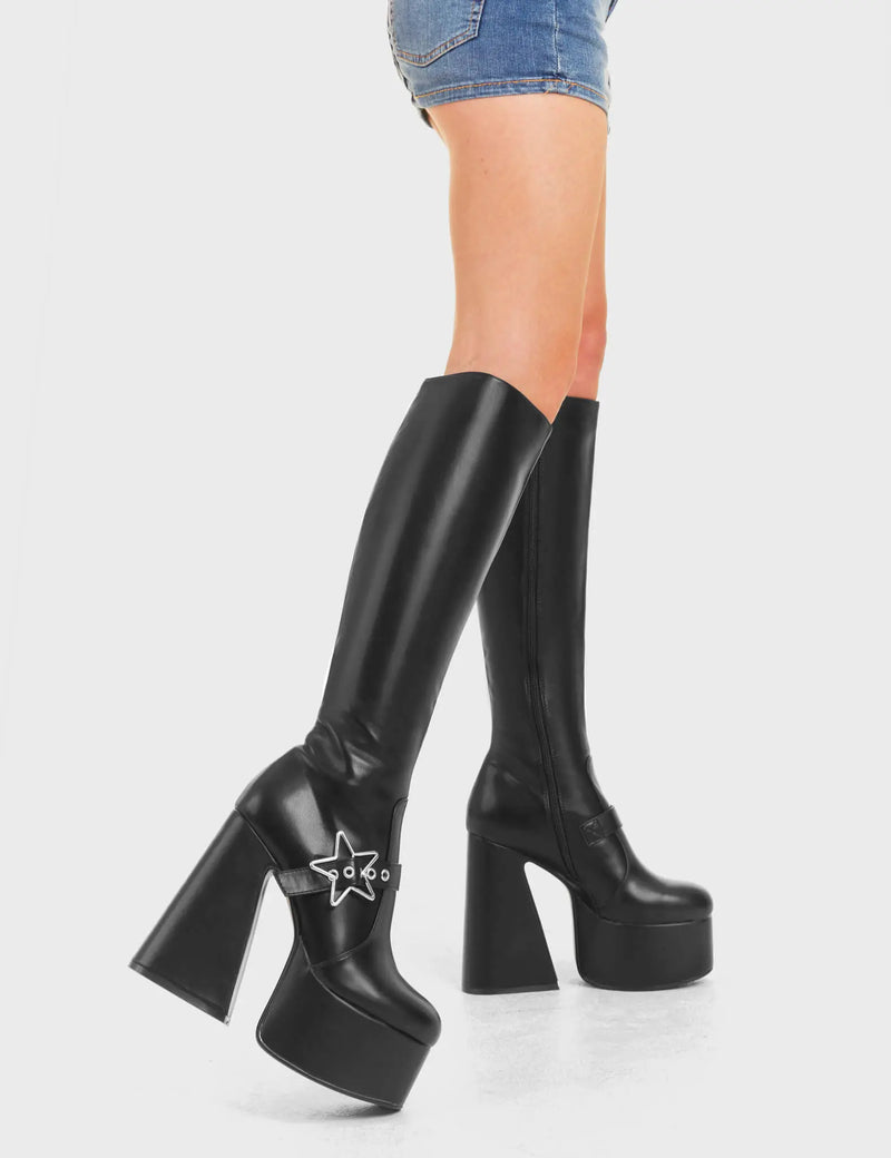 KEEPING IN CUTE
  
  I'm Your Star Platform Knee High Boots in Black faux leather. These platform boots feature a minimalist look with a silver star buckle. Made with eco-friendly materials and 100% cruelty-free, these platform boots are as ethical as they are chic.
  
  - Platform Height
  - Knee high 
  - Silver star buckle
  - Flared heel
  - High Heel
  - 100% vegan 
  
  SKU: LMF 3359 - BlackPU