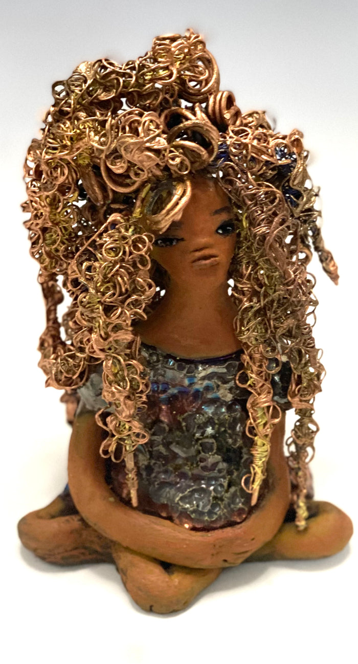 Meet Tiana! Tiana stands 5" x 3.5" x 3.5" and weighs 10 ozs. She has a lovely honey brown complexion. Tiana's dress is  metallic copper. She has her long loving arms resting at her side. " I am really pleased  with Tiana's blue beaded necklace and her new wire hair Find a place in your space for Tiana!