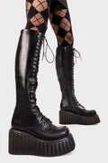Lace Obsessed
  
  Important Chunky Creeper Platform Knee High Boots in Black faux leather. These black platform boots feature adjustable black lace up detail, turn heads with each step. Made with eco-friendly materials and 100% cruelty-free, these platform boots are as ethical as they are Hot!
  
  - Platform Height
  - Black zipper
  - Blace laces with silver eyelets
  - Chunky platform creeper wedge sole
  - Round Toe 
  - 100% vegan 
  
  SKU: LMF 2217 - BlackPU