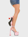 LOVESTEP
  
  Lavender Platform Sandals in Pink Faux Leather. These heels features a adjustable Pink ankle strap with a heart shaped silver buckle and silver eyelets. Also features a open toe design with a heart shaped heel and a red heart at the bottom. Made with eco-friendly materials and 100% cruelty-free!
  
  - Platform Height
  - Heel Height
  - Adjustable ankle strap
  - Heart shaped silver buckle
  - Heart shaped Heel
  - Red Heart
  - Platform sole
  - Open Toe
  - 100% vegan
  
  LMF 4456 - PinkPU