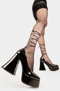 SELF LOVE CURES ALL
 
 Lost Queen Platform Heels in Black Patent. These vegan Platform Heels feature a wrap around lace strap and a high Platform sole, perfect for adding height, style and glam to any outfit. Made with eco-friendly materials and 100% cruelty-free, these Heels are as ethical as they are cute! 
 
 
 - Platform Height: 2.6 inch
 - Heel Height: 5.5 inch
 - Red Heart
 - Lace wrap around strap 
 - High platform sole
 - Flaired Heel
 - Round toe 
 - 100% vegan 
 
 SKU: LMC 266 - BlackPAT