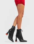 LOVE COMPETITION
 
 Love You Better Platform Ankle Boots in Black faux leather. These vegan boots feature a lace up design with a heart shaped heel and a red heart heart at the bottom. Spreading the love with every step. Made with eco-friendly materials and 100% cruelty-free, these Creepers are as ethical as they are stylishly sweet!
 
 
 - Platform Height:
 - Low Ankle Length
 - Red Heart Heel
 - Heart Detailing
 - Lace Up Design
 - Platform Sole
 - Round Toe
 - 100% Vegan
 
 SKU: LMF 5050 - BlackPU