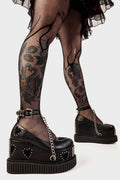 Royal Elegance
 
 Majesty Chunky Platform Creeper shoes in black faux leather. These black vegan Platform shoes feature black suede hearts throughout with a perimeter of silver studs and a black ankle strap featuring a silver hanging chain, reach new heights of style and authority.
 
 
 - Platform Height
 - Heel Height 
 - Sqaure buckles 
 - Silver studs
 - Black suede hearts
 - Silver chain 
 - Black strap with silver eyelets
 - Chunky creeper sole
 - Round Toe
 - 100% vegan 
 
 SKU: LMF 2116 - Black/Heart