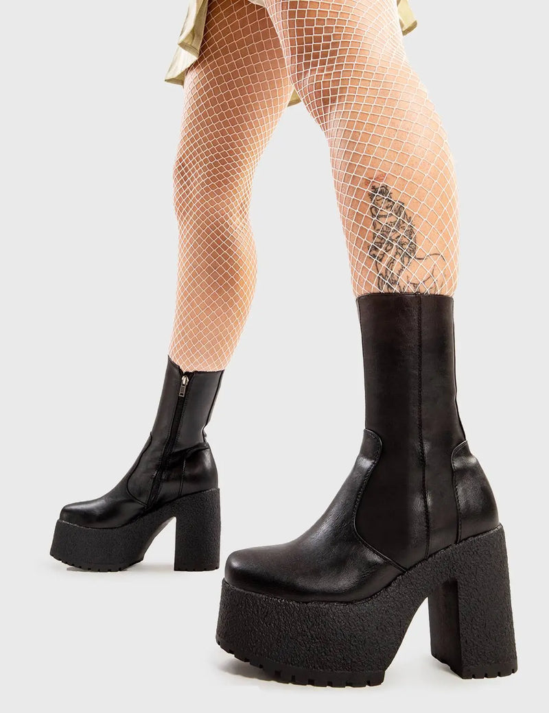 Spicy Platforms
  
  Mannequin Worthy Platform Ankle Boots in Black faux leather. These platform boots feature on our chunky platform sole, set hot trends step by step. Made with eco-friendly materials and 100% cruelty-free, these platform boots are as ethical as they are HOT!
  
  - Platform Height
  - Heel Height
  - Black Zipper
  - Mid ankle length
  - Chunky Platform sole
  - Rubber grip
  - Round Toe 
  - 100% vegan 
  
  SKU: LMF 2809 - BlackPU