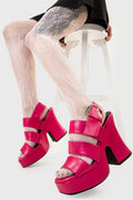 Sun Kissed Steps
 
 Mentally Wired Platform Sandals in Fuchsia. These platform sandals feature three straps across the upper with a adjustable strap across the heel, taste the sweetness of summer with stylish sandals. Made with eco-friendly materials and 100% cruelty-free, these platform boots are as ethical as they are HOT!
 
 - Platform Height
 - Heel Height
 - Adjustable strap
 - Silver eyelets with D shaped buckle
 - Chunky Platform sole
 - Round Toe 
 - 100% vegan 
 
 SKU: LMF 2503 - FuchsiaPU