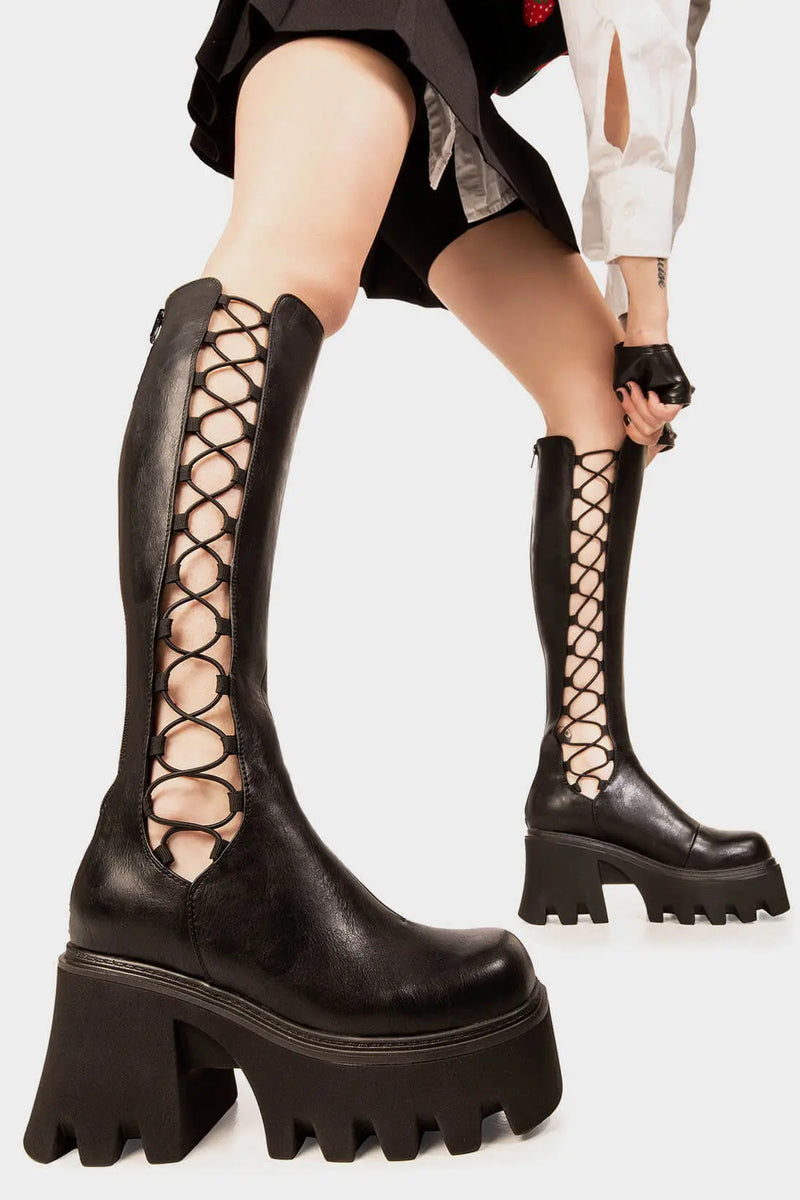 OUT ON THE TOWN 
 
 MIsery Business Chunky Platform Knee High Boots in Black faux leather. These Black vegan Knee High Boots feature an lace gusset design and a CHUNKY Platform sole, perfect for adding height and style to any outfit. Made with eco-friendly materials and 100% cruelty-free, these boots are as ethical as they are cute!
 
 
 - Platform Height: 3.3 inch
 - Knee High length
 - Black zipper 
 - Chunky Platform sole
 - Lace elastic gusset
 - Square toe 
 - 100% vegan 
 
 SKU: LMF 1247 - BlackPU