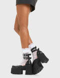 LOVED UP
  
  Mistake Chunky Platform Shoes in Black faux leather. These vegan western Boots feature a minimalist design with two adjustable straps, very cute. Made with eco-friendly materials and 100% cruelty-free, these boots are as ethical as they are chic!
  
  
  - Platformed
  - Ankle length
  - Two adjustable straps 
  - Silver heart buckles
  - Chunky platform sole
  - Rounded toe 
  - 100% vegan 
  
  SKU: LMF 3927 - BlackPU