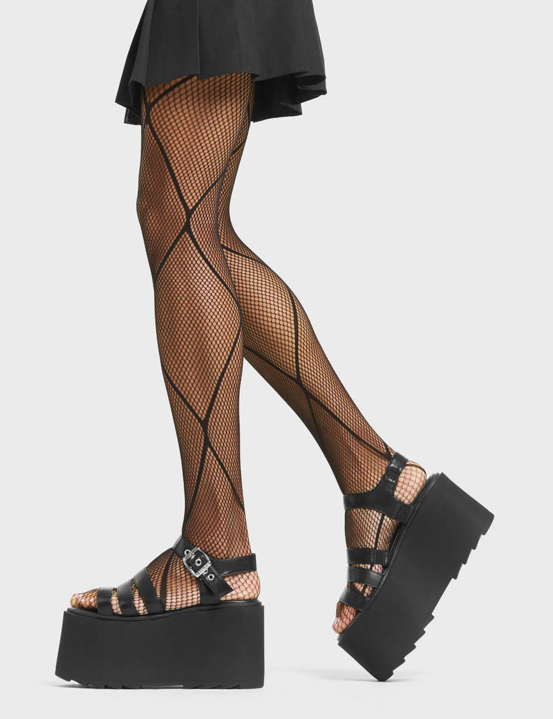 BRAZEN

My Chemistry Chunky Platform Sandals in Black faux leather. These platform sandals feature an adjustable strap across the upper with silver eyelets and a sqaure shaped buckle. Also features cut out detail. Made with eco-friendly materials and 100% cruelty-free, these platform sandals are ethical and HOT!

- Platform Height
- Heel Height
- Adjustable strap
- Square shaped buckle
- Silver eyelets
- Chunky Platform sole
- Shark's teeth grip
- Round Toe
- 100% vegan

SKU: LMF LMF 4540 - BlackPU