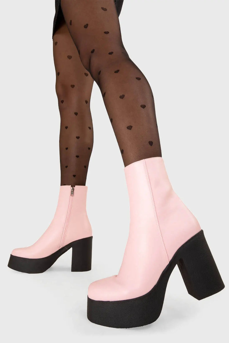 THE TRENDING ONE
  
  My Hero Platform Ankle Boots in Pink faux leather. These Black vegan Ankle Boots feature an elegant, minimalist design and a Platform sole and heel, perfect for adding height and style to any outfit. Made with eco-friendly materials and 100% cruelty-free, these boots are as ethical as they are stylish.
  
  
  - Platform Height: 1.25 inch
  - Heel Height: 4 inch
  - Low ankle length
  - Pink zipper 
  - Platform sole
  - Square toe 
  - 100% vegan 
  
  SKU: LMF 1211 - PinkPU