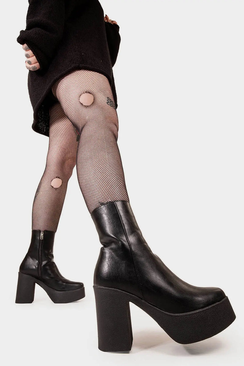 THE TRENDING ONE
  
  My Hero Platform Ankle Boots in Black faux leather. These Black vegan Ankle Boots feature an elegant, minimalist design and a Platform sole and heel, perfect for adding height and style to any outfit. Made with eco-friendly materials and 100% cruelty-free, these boots are as ethical as they are stylish.
  
  
  - Platform Height: 1.25 inch
  - Heel Height: 4 inch
  - Low ankle length
  - Black zipper 
  - Platform sole
  - Square toe 
  - 100% vegan 
  
  SKU: LMF 1211 - BlackPU