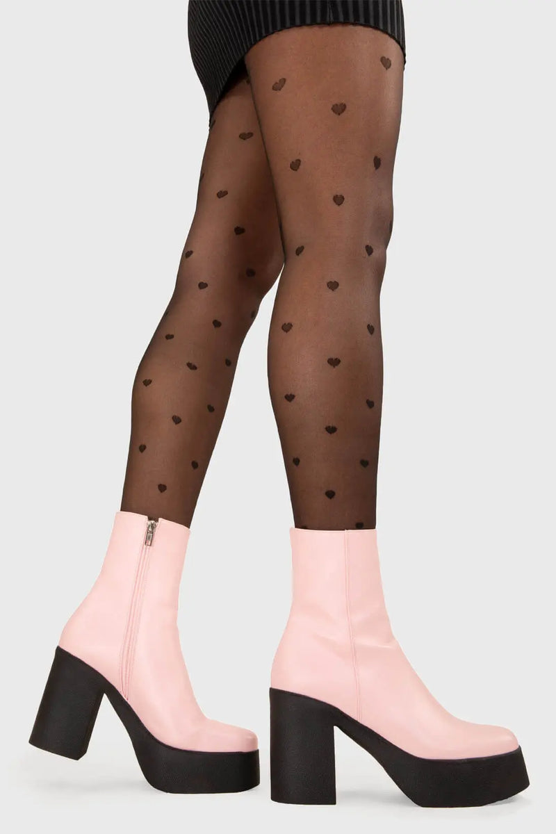 THE TRENDING ONE
  
  My Hero Platform Ankle Boots in Pink faux leather. These Black vegan Ankle Boots feature an elegant clutter free design and a Platform sole and heel, perfect for adding height and style to any outfit. Made with eco-friendly materials and 100% cruelty-free, these boots are as ethical as they are stylish.
  
  
  - Platform Height: 1.25 inch
  - Heel Height: 4 inch
  - Low ankle length
  - Pink zipper 
  - Platform sole
  - Square toe 
  - 100% vegan 
  
  SKU: LMF 1211 - PinkPU