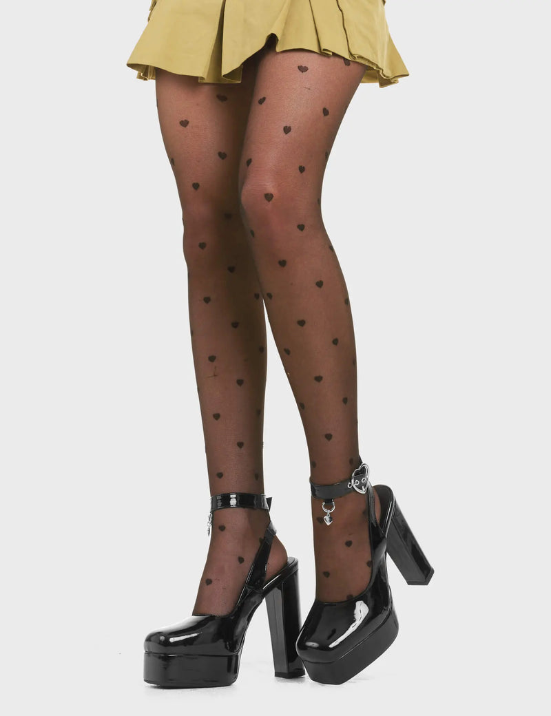 STEP FREELY
  
  My Way Platform Heels in Black Patent. These heels features a adjustable black ankle strap with silver eyelets and a heart shaped buckle, Also features a silver hanging charm Step Freely with these platform heels. Made with eco-friendly materials and 100% cruelty-free!
  
  - Platform Height
  - Heel Height
  - Adjustable Black Strap
  - Silver eyelets
  - Heart shaped buckle
  - Platform sole
  - Pointed Toe
  - 100% vegan
  
  SKU: LMF 3791 - BlackPAT