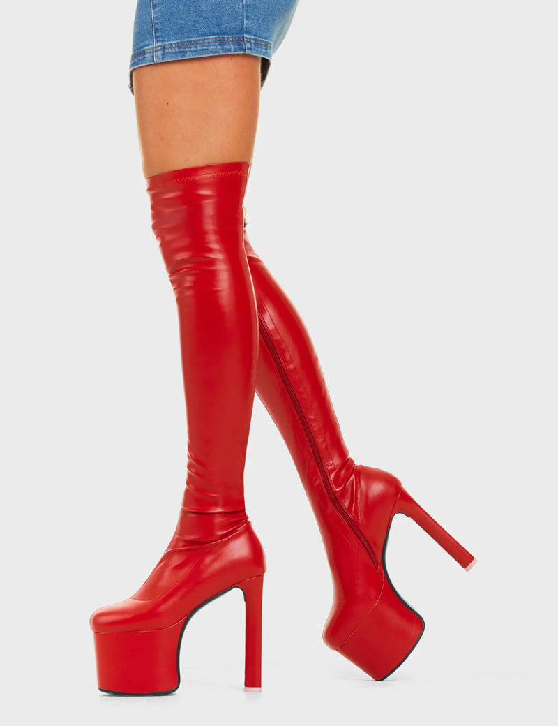 RED ALERT
  
  Night Owl Platform Thigh High Boots in Red faux leather. These platform boots feature a minimalist design, with a fiited feel and a Heart shaped hee with a pink heart at the bottom, the perfect way to elevate any look. Made with eco-friendly materials and 100% cruelty-free, these platform boots are as ethical as they are cool.
  
  - Platform Height
  - Heel Height
  - Fitted-feel
  - Heart shaped heel
  - Pink heart
  - Red Zip
  - Platform sole
  - 100% vegan
  
  SKU: LMF 4650 - RedPU