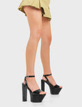 GAMES ON
  
  Not Over Yet Platform Sandals in Black Patent. These Sandals features a adjustable black ankle strap with silver eyelets and a silver buckle, Slay with these platform Sandals. Made with eco-friendly materials and 100% cruelty-free!
  
  - Platform Height
  - Heel Height
  - Adjustable ankle strap
  - Silver eyelets with silver buckle
  - Shark's teeth grip
  - Chunky Platform sole
  - Open Toe 
  - 100% vegan 
  
  SKU: LMF 3807 - BlackPAT