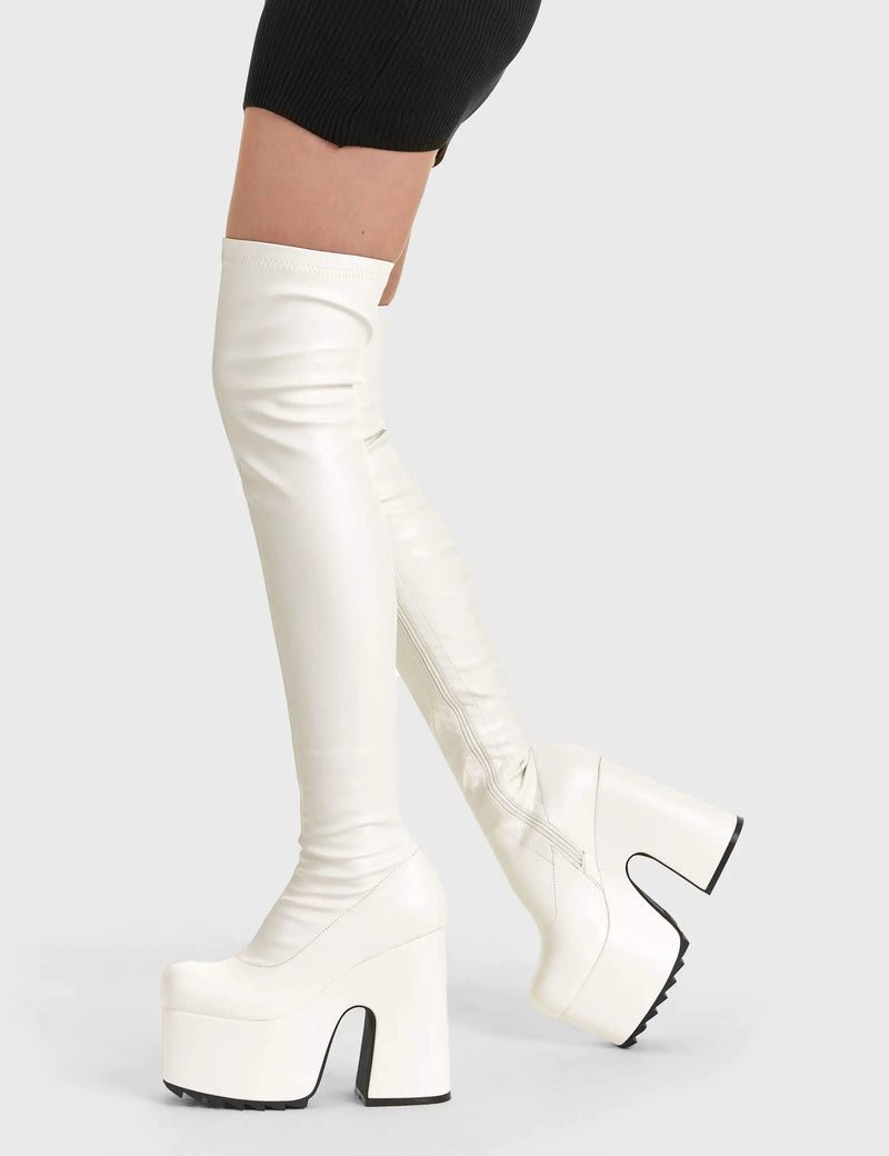 Solid Slammers
  
  Not Ready Chunky Platform Thigh High Boots in White faux leather. These white vegan Platform Boots feature on our chunky platform sole, make a statment and stomp with chunky elevation. Made with eco-friendly materials and 100% cruelty-free, these platform boots are as ethical as they are dominant!
  
  
  - Platform Height
  - Heel Height 
  - White zipper
  - Shark's teeth rubber grip 
  - Chunky platform sole
  - Round Toe
  - 100% vegan 
  
  SKU: LMF 2073 - WhitePU