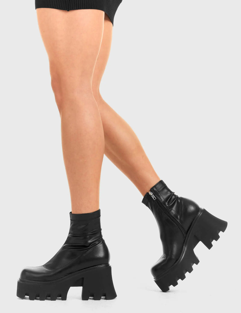 UPGRADE YOUR STYLE
  
  Notorious Chunky Platform Ankle Boots in Black fitted faux leather. These vegan western Boots feature a minimalist look with chunky soles, very classy. Made with eco-friendly materials and 100% cruelty-free, these boots are as ethical as they are edgy!
  
  
  - Chunky Platform
  - Ankle length
  - Rounded toe 
  - 100% vegan 
  
  SKU: LMF 3601 - LMF 3601 - BlackStretchPU