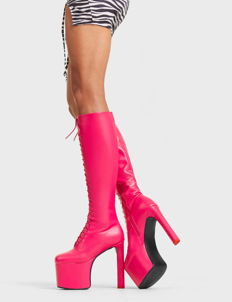 TRACKSTAR
  
  Nowhere To Run Platform Knee High Boots in Fuchsia faux leather. These platform boots feature a stylish look with a heart shaped heel with a red heart at the bottom. These boots also feature lace up design across the entire upper of the boots. Made with 100% Vegan materials.
  
  - Platform Height 
  - Knee High Length 
  - Heart Shaped Heel
  - Red Heart Detail
  - Red Heart Detail 
  - Lace Up Design 
  - Black Zip 
  - High Heel 
  - 100% Vegan 
  
  SKU: LMF 4648 - FuchsiaPU