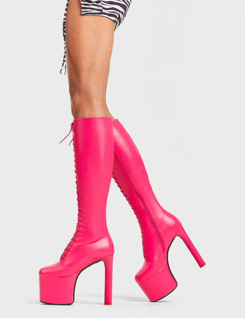 TRACKSTAR
  
  Nowhere To Run Platform Knee High Boots in Fuchsia faux leather. These platform boots feature a stylish look with a heart shaped heel with a red heart at the bottom. These boots also feature lace up design across the entire upper of the boots. Made with 100% Vegan materials.
  
  - Platform Height 
  - Knee High Length 
  - Heart Shaped Heel
  - Red Heart Detail
  - Red Heart Detail 
  - Lace Up Design 
  - Black Zip 
  - High Heel 
  - 100% Vegan 
  
  SKU: LMF 4648 - FuchsiaPU
