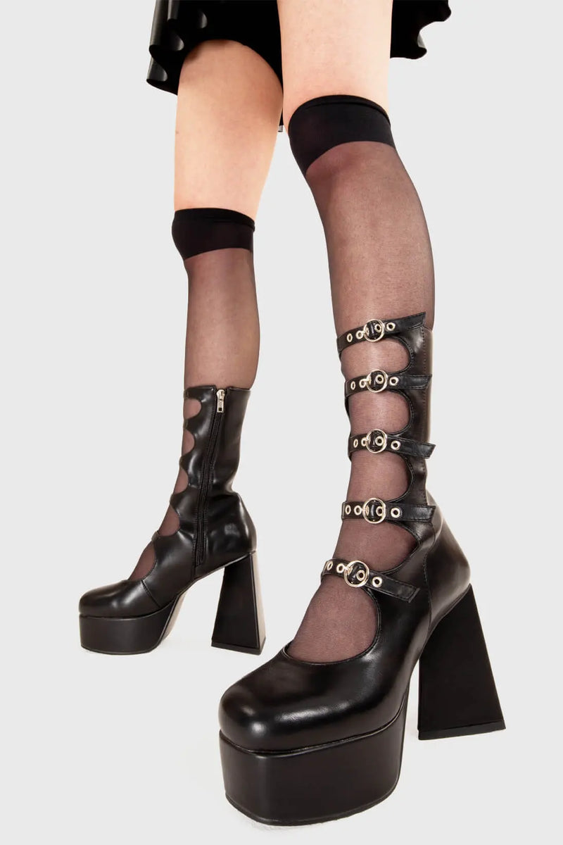 SECURED 
  
  Padlock Platform Calf Boots in Black faux leather. These platform boots feature five adjustable starps with silver circle buckles. Made with eco-friendly materials and 100% cruelty-free, these platform boots are as ethical as they are chic.
  
  - Platform Height
  - Silver circle buckles
  - Calf length
  - Five adjustable straps
  - Triangle heel
  - High Heel
  - 100% vegan 
  
  SKU: LMF 3339 - BlackPU