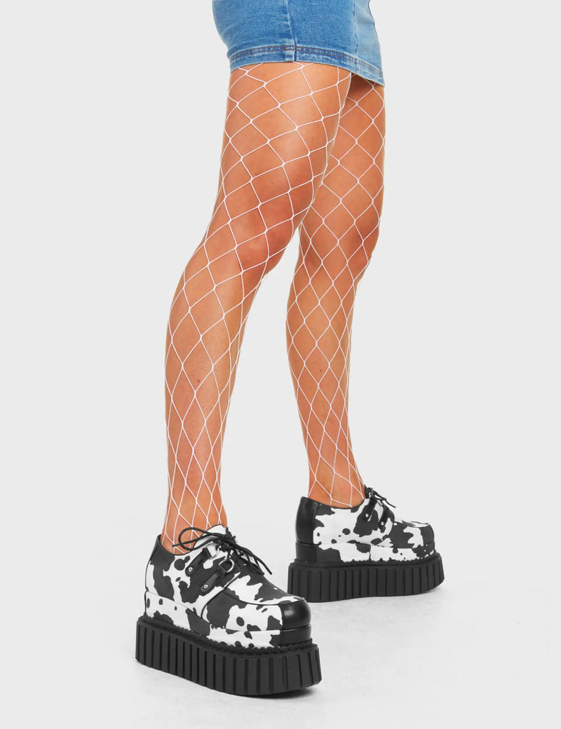 ANIMALISTIC TENDANCIES
  
  Party Animal Chunky Platform Creeper Shoes in Cowprint faux leather. These creeper shoes feature a cowprint design throughout the shoes. Also features black lace detailing with silver loops. Made with eco-friendly materials and 100% cruelty-free, these platform boots are as ethical as they are HOT!
  
  - Platform Height
  - Black Lace detail
  - Silver loops
  - Cowprint design
  - Chunky creeper sole
  - Round Toe
  - 100% vegan
  
  SKU: LMF 4561 - Cowprint