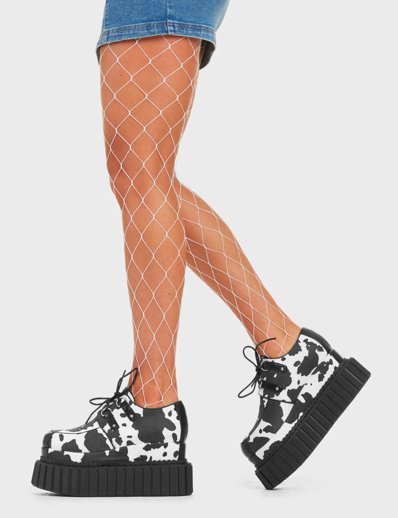 ANIMALISTIC TENDANCIES
  
  Party Animal Chunky Platform Creeper Shoes in Cowprint faux leather. These creeper shoes feature a cowprint design throughout the shoes. Also features black lace detailing with silver loops. Made with eco-friendly materials and 100% cruelty-free, these platform boots are as ethical as they are HOT!
  
  - Platform Height
  - Black Lace detail
  - Silver loops
  - Cowprint design
  - Chunky creeper sole
  - Round Toe
  - 100% vegan
  
  SKU: LMF 4561 - Cowprint