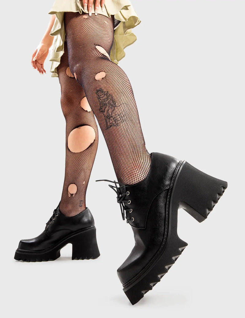 Too Kool For Skool
  
  Passing By Chunky Shoes in Black faux leather. These shoes feature an elegant, minimalist design, the perfect way to level-up your looks. Made with eco-friendly materials and 100% cruelty-free, these shoes are as ethical as they are trendy.
  
  - Platform Height
  - Heel Height 
  - lace-up with silver eyelets
  - Shark's teeth grip
  - Chunky Platform sole
  - 100% vegan 
  
  SKU: LMF 2909 - BlackPU