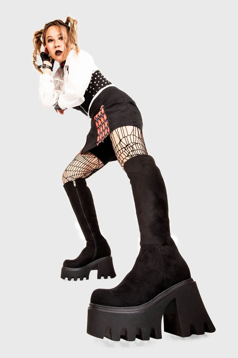Sleek Sensations
  
  Ready Chunky Platform Knee High Boots in Black Suede. These black vegan Platform Boots feature on our chunky platform sole, simple steps with exceptional comfort! Made with eco-friendly materials and 100% cruelty-free, these platform boots are as ethical as they are comfortable!
  
  
  - Platform Height
  - Wide fit 
  - Black zipper 
  - Chunky Platform sole
  - Round Toe
  - 100% vegan 
  
  SKU: