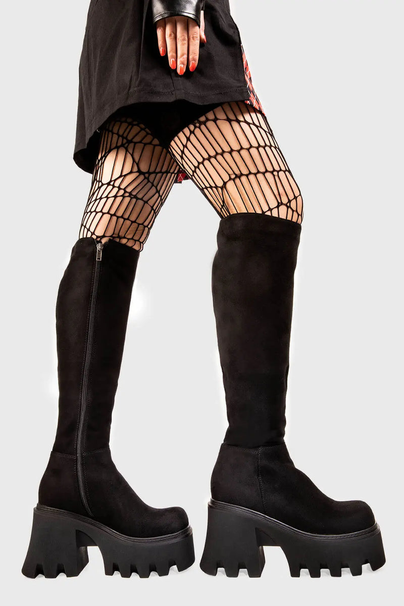 Sleek Sensations
  
  Ready Chunky Platform Knee High Boots in Black Suede. These black vegan Platform Boots feature on our chunky platform sole, simple steps with exceptional comfort! Made with eco-friendly materials and 100% cruelty-free, these platform boots are as ethical as they are comfortable!
  
  
  - Platform Height
  - Wide fit 
  - Black zipper 
  - Chunky Platform sole
  - Round Toe
  - 100% vegan 
  
  SKU: