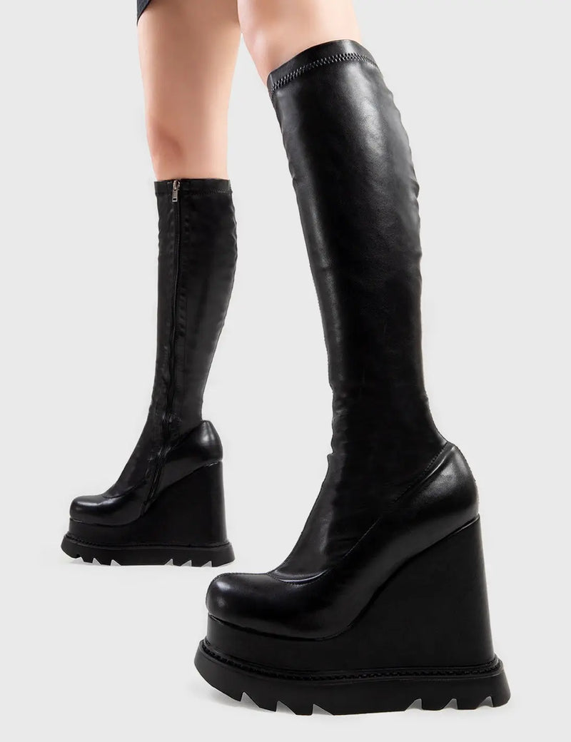 Being Badass
  
  Roses Chunky Platform Calf Boots in Black faux leather. These Black vegan Wedge boots feature a minimalist design with our Platform wedge sole, perfect for adding height and style to any look. Made with eco-friendly materials and 100% cruelty-free, these boots are as ethical as they are badass!
  
  
  - Platform Height: 
  - Heel Height
  - Black Zip
  - Wedge sole
  - Round Toe
  - 100% vegan 
  
  SKU: LMF 2947 - BlackPU