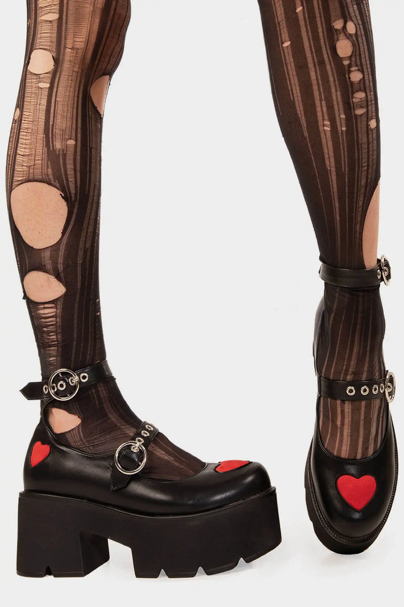 THE ICON
  
  Rosey Love Chunky Mary Jane Shoes in Black Faux Leather. These Mary Janes feature a Red faux suede hearts on a Chunky and comfortable Platform sole. Everyone needs a pairs of Mary Janes! Made with eco-friendly materials and 100% cruelty-free, these Mary Janes are as ethical as they are cute!
  
  
  - Platform Height: 3 inch
  - T Bar structure
  - Red Hearts
  - O shaped buckles and silver eyelets
  - Chunky Platform sole
  - Round toe 
  - 100% vegan 
  
  SKU: LMS 449 - BlackPU/Red
