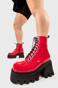 TAKE ON THE WORLD
  
  Run To You Chunky Platform Ankle Boots in Red Patent. These vegan Boots feature a CHUNKY Platform sole and large O shaped eyelets, perfect for adding height and edge to any outfit. Made with eco-friendly materials and 100% cruelty-free, these Boots are as ethical as they are hot!
  
  
  - Platform Height: 3.3 inch
  - Black zipper
  - Lace up
  - O shaped buckle and silver eyelets
  - CHUNKY Platform sole
  - Square toe 
  - 100% vegan 
  
  SKU: LMF 1370 - RedPAT