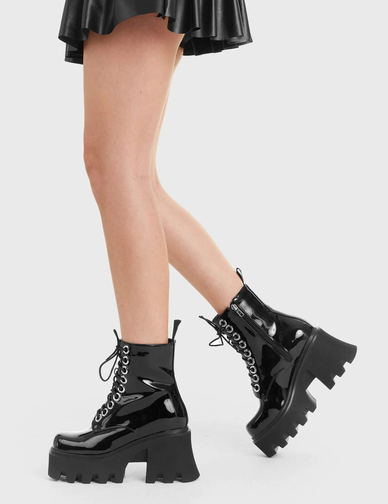 TAKE ON THE WORLD
  
  Run To You Chunky Platform Ankle Boots in Black Patent. These vegan Boots feature a CHUNKY Platform sole and large O shaped eyelets, perfect for adding height and edge to any outfit. Made with eco-friendly materials and 100% cruelty-free, these Boots are as ethical as they are hot!
  
  
  - Platform Height: 3.3 inch
  - Black zipper
  - Lace up
  - O shaped buckle and silver eyelets
  - CHUNKY Platform sole
  - Square toe 
  - 100% vegan 
  
  SKU: LMF 1370 - BlackPAT