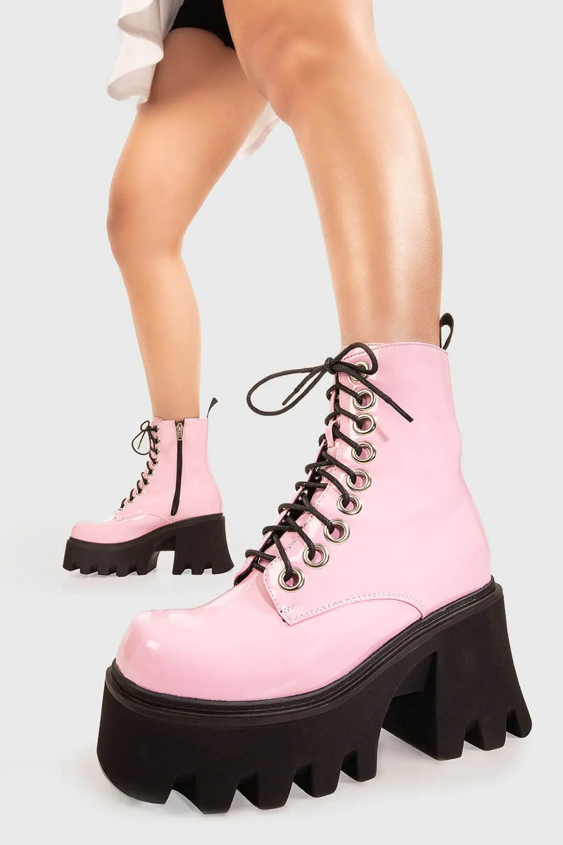 TAKE ON THE WORLD
  
  Run To You Chunky Platform Ankle Boots in Pink Patent. These vegan Boots feature a CHUNKY Platform sole and large O shaped eyelets, perfect for adding height and edge to any outfit. Made with eco-friendly materials and 100% cruelty-free, these Boots are as ethical as they are hot!
  
  
  - Platform Height: 3.3 inch
  - Black zipper
  - Lace up
  - O shaped buckle and silver eyelets
  - CHUNKY Platform sole
  - Square toe 
  - 100% vegan 
  
  SKU: LMF 1370 - PinkPAT