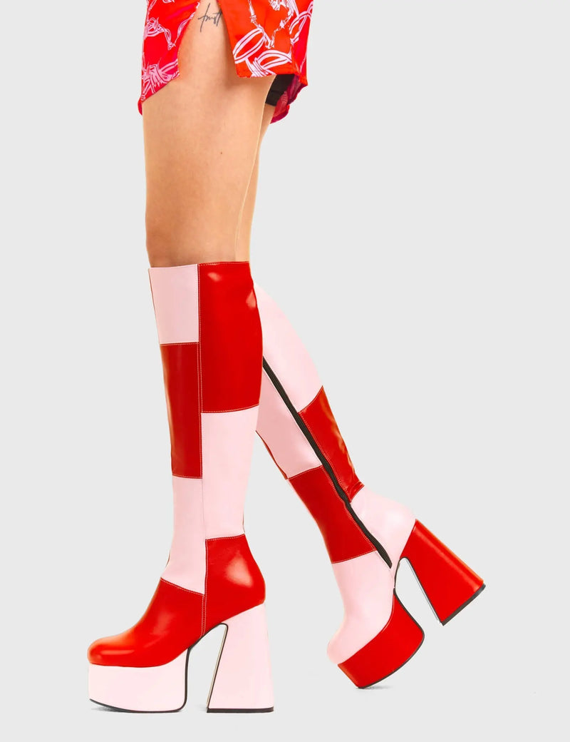 TIME TO DANCE
  
  Runway Platform Knee High Boots in Pink and Red faux leather. These platform boots feature a pink and red patch work design with a triangle heel, keeping it nice and classy. Made with eco-friendly materials and 100% cruelty-free, these platform boots are as ethical as they are chic.
  
  - Platform Height
  - Knee high length
  - Patch work design
  - Triangle heel
  - High Heel
  - 100% vegan 
  
  SKU: LMF 3361 - PinkPU/RedPU