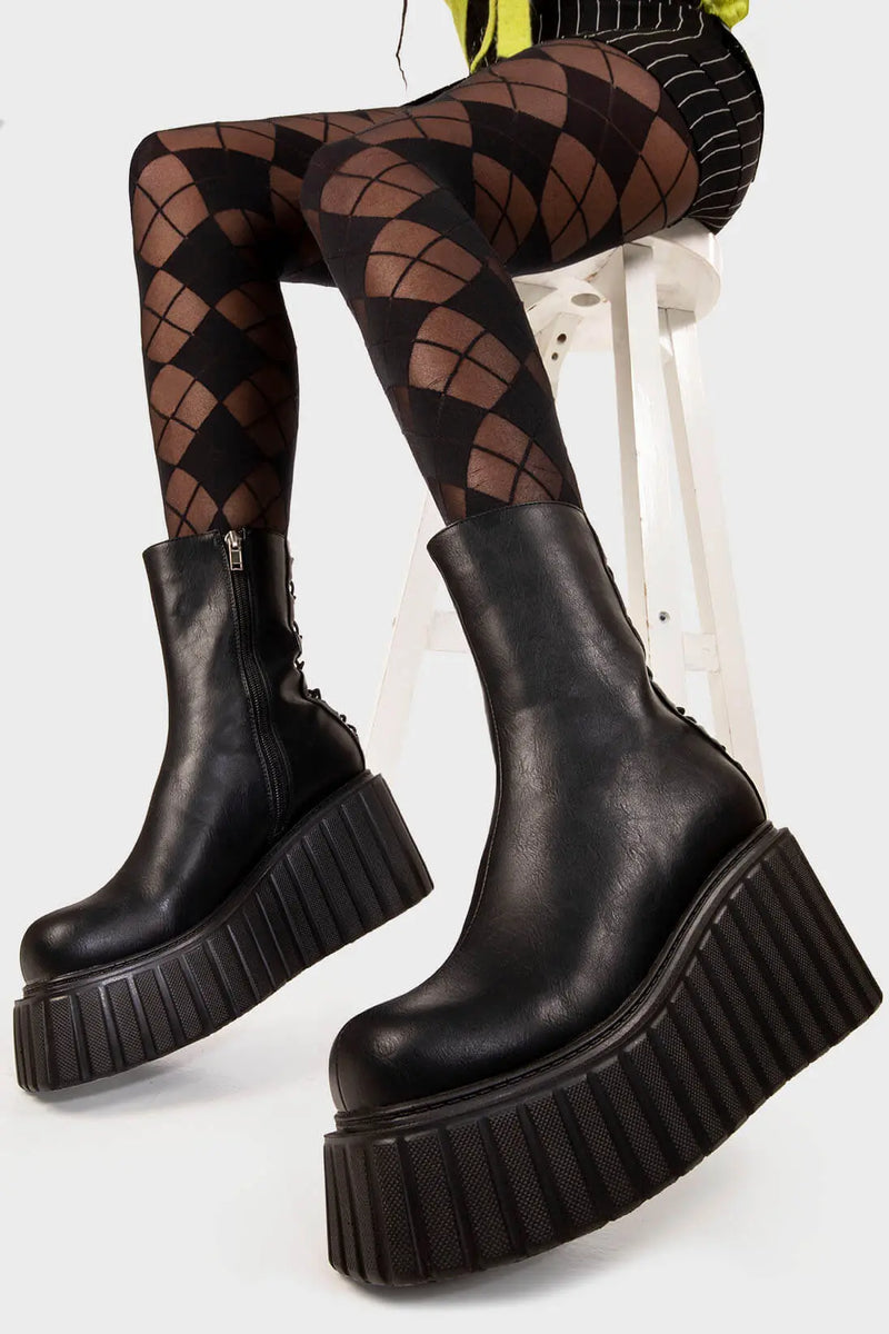 Clean and Crisp
  
  Say My Name Chunky Ankle Creeper Boots in Black faux leather. These black platform boots feature black lace up detail with silver eyelets towards the back, making a bold statment with each step.Made with eco-friendly materials and 100% cruelty-free, these platform boots are as ethical as they are Sleek!
  
  - Platform Height
  - Black zipper
  - Black laces and silver eyelets 
  - Chunky platform creeper wedge sole
  - Round Toe 
  - 100% vegan 
  
  SKU: LMF 2212 - BlackPU