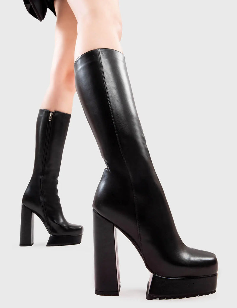 Not Your Basic Boots
  
  Second Nature Platform Knee High Boots in Black faux leather. These platform boots feature a minimalist design, perfect with any outfit. Made with eco-friendly materials and 100% cruelty-free, these platform boots are as ethical as they are Perfect!
  
  - Platform Height
  - Heel Height
  - Black Zipper
  - Knee length
  - Platform sole
  - Shark's teeth grip
  - High Heel
  - 100% vegan 
  
  SKU: LMF 2842 - BlackPU