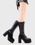 Hella Hot!
  
  Siren Platform Calf Boots in Black faux leather. These platform boots feature black lace up detail with D shaped eyelets, step up your fashion game.Made with eco-friendly materials and 100% cruelty-free, these platform boots are as ethical as they are Hella Hot!
  
  - Platform Height
  - Heel Height
  - Black Zipper
  - Black laces and Silver D eyelets 
  - Calf length
  - Chunky Platform sole
  - Rubber grip
  - Round Toe 
  - 100% vegan 
  
  SKU: LMF 2813 - BlackPU