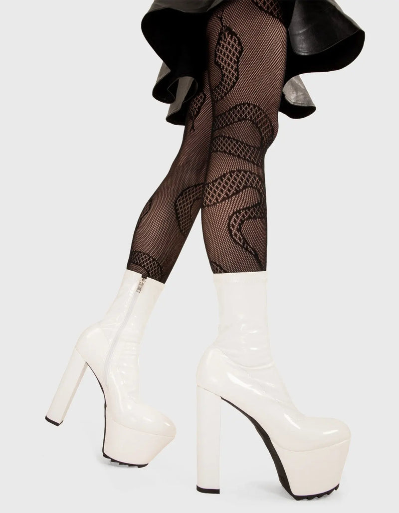 Not Your Basic Boots!
  
  So Sleek Platform Ankle Boots in White Patent. These platform boots feature a minimalist design with a fitted feel, the perfect way to elevate any outfit. Made with eco-friendly materials and 100% cruelty-free, these platform boots are as ethical as they are eye-catching.
  
  - Platform Height
  - Heel Height
  - White zip
  - High Heel
  - Pointed toe
  - Shark's Teeth Grip
  - 100% vegan 
  
  SKU: LMF 3182 - WhiteStretchPAT