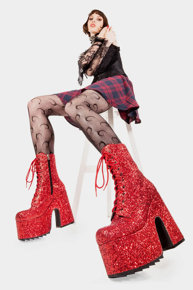 Dazzling Delights
 
Spotlight Chunky Platform Ankle Creeper Boot in Red Glitter. These red vegan Platform Boots feature our iconic glitter detail througout with adjustable lace up detail, shiny perfection to glow with every step. Made with eco-friendly materials and 100% cruelty-free, these platform boots are as ethical as they are Radiant!


- Platform Height
- Heel Height 
- Black zipper 
- Red laces and silver eyelets 
- Chunky Creeper sole
- Round Toe
- 100% vegan 

SKU: LMF 2046 - RedGlitter