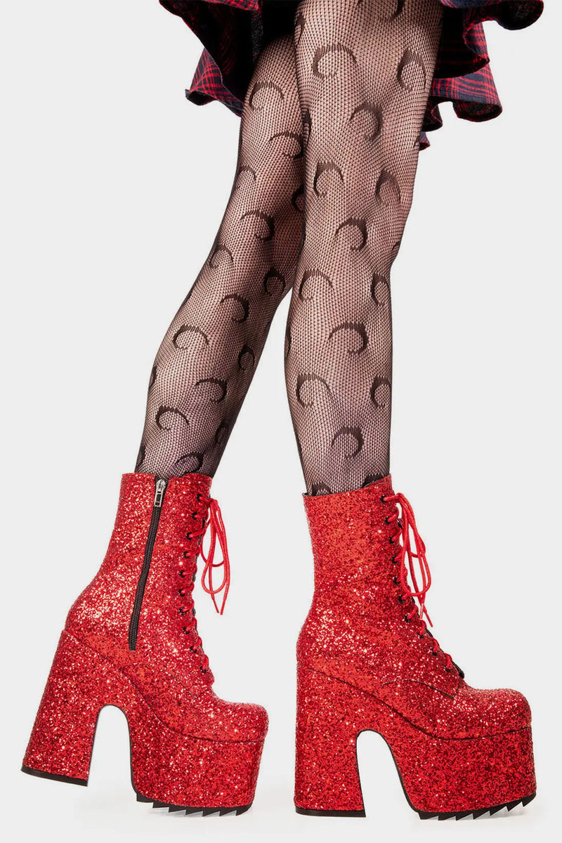 Dazzling Delights
 
Spotlight Chunky Platform Ankle Creeper Boot in Red Glitter. These red vegan Platform Boots feature our iconic glitter detail througout with adjustable lace up detail, shiny perfection to glow with every step. Made with eco-friendly materials and 100% cruelty-free, these platform boots are as ethical as they are Radiant!


- Platform Height
- Heel Height 
- Black zipper 
- Red laces and silver eyelets 
- Chunky Creeper sole
- Round Toe
- 100% vegan 

SKU: LMF 2046 - RedGlitter